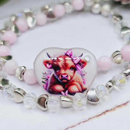 butterfly pink highland cow (charm only)