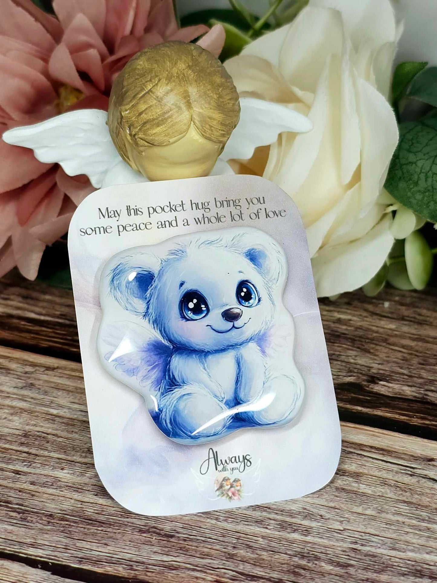 Sitting angel Bear pocket hug placed on a backing card